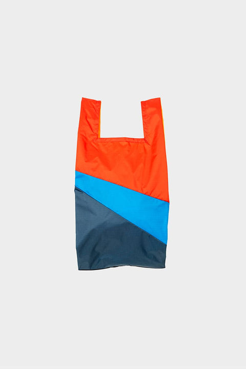 The New Shopping Bag Multi Tone Small von Susan Bijl, Vorderseite, diagonale Farbflächen in Sonnengelb, Zartrosa und Anthrazit