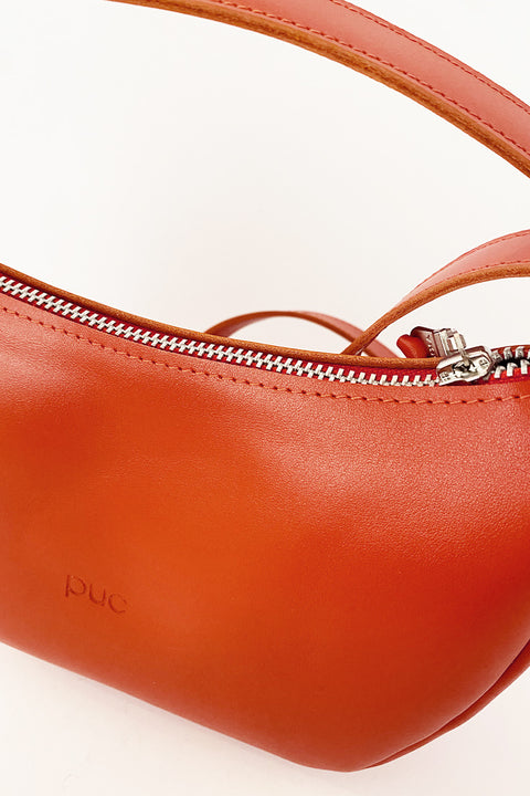 Stilvolle Moowalk S Tasche in Sunset Orange, perfekt für moderne Outfits und vielseitige Anlässe