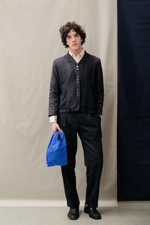 Einkaufstasche Mono Yves Small Susan Bijl, zusammengefaltet, ultrakompaktes Format aus recyceltem Nylon