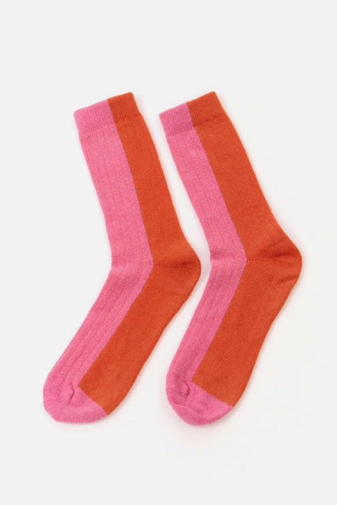 Zweifarbige Wollsocken in Pink und Orange mit vertikaler Trennlinie