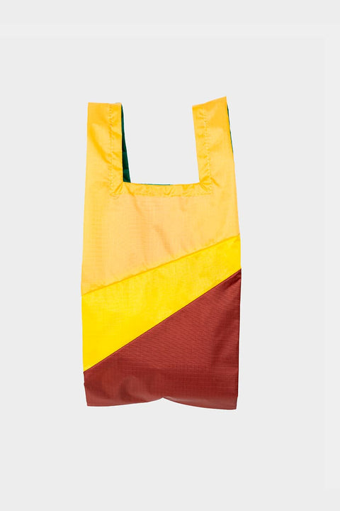 The New Shopping Bag Multi TV Yellow Medium Susan Bijl, befüllt, 10 Liter, > 20 kg Tragkraft, PFAS-freies recyceltes Nylon