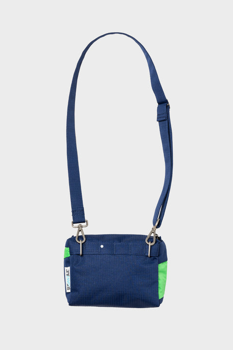 Dunkelblaue und hellgrüne Bum Bag, ideal für Fahrradfahrer