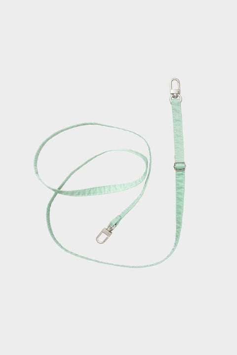 Der "New Strap" in Kombination mit der "New Pouch" als Umhängetasche