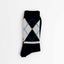 Detailansicht des karierten Argyle-Musters der Socken