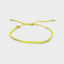 Lebhaftes Neongelbes Armband mit goldenen Highlights von Blush Indigo