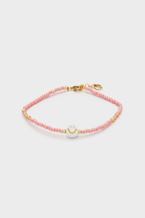 Armband mit rosa Rocailles und Smiley-Perle von Blush Indigo