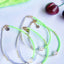 Armband Birthday 7 Blush Indigo – Detailansicht Smiley-Perle in der Mitte, Farbübergang Greige und Neon Grün