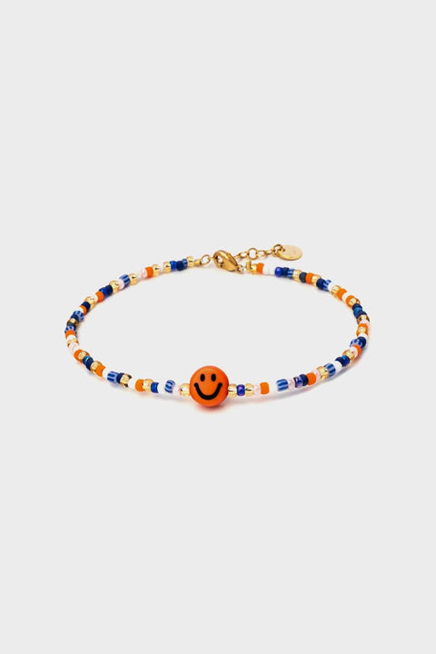 Armband mit orangefarbenem Smiley und bunten Glasperlen