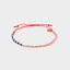 Armband Sweet String Orange Sprinkles von Blush Indigo, leuchtendes Neon Orange Nylonband mit Perlen in Frosted Coral, Matt White, Indigo Blue und Gold