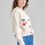 Damen Cardigan aus Bio-Baumwolle mit Jacquard-Beerenmotiv in Vanilleweiß