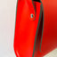 Brottasche LARGE papoutsi Neonorange – Detailansicht mattes Rindsleder in leuchtendem Neonorange, Berliner Handarbeit