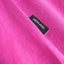 Side Slit of the Visby T-Shirt in Violet-Pink, Detail View