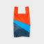 The New Shopping Bag Multi Tone Small von Susan Bijl, Vorderseite, diagonale Farbflächen in Sonnengelb, Zartrosa und Anthrazit