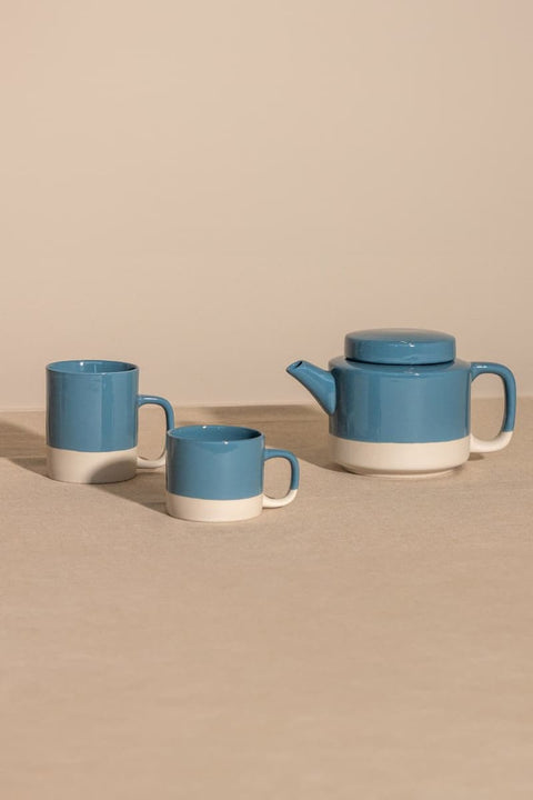 Cyl-Kollektion von KINTA in Blau, mehrere Steinzeug-Produkte – Tassen, Teekanne und Schalen in Blau KINTA Cyl Kollektion Blau, handgefertigtes Steinzeug aus Hanoi, Fair Trade, matt mit glänzenden Akzenten