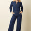 Blauer Onyx Denim Jumpsuit mit Stretch, Blusenkragen und praktischen Taschen