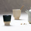 Cup Rutunda S KINTA Sea Blue, Detailansicht sattes Dunkelblau mit Sandkörnern, kompakte Espressotasse