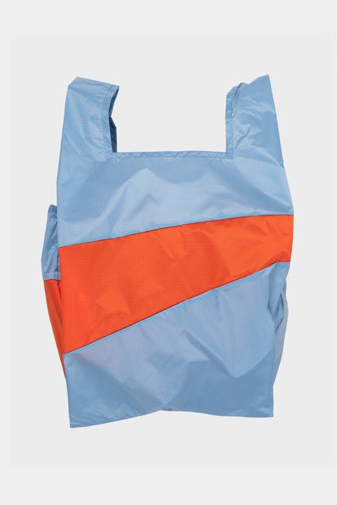 Die moderne und stylische The New Shopping Bag in Hellblau und Orange