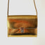 Papoutsi Brottasche aus Naturleder in Gold