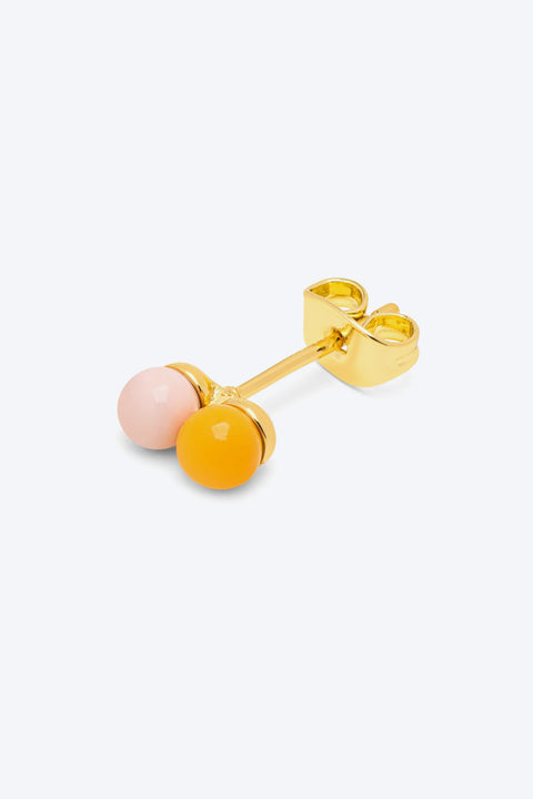 Double Color Ball LULU Copenhagen – Detailansicht zweifarbige Emaille-Kugel in Hellrosa und Hellorange auf vergoldetem Messing, E-Coating