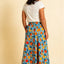 Suzi Skirt in Oranges Pretty Vacant, Bewegungsansicht weite A-Linien-Silhouette, wadenlange Länge