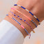 Armband Marseille Blush Indigo – Detailansicht Farbmix Neon Pink, Coral, Weiß und Indigo, handgefertigt auf Bali