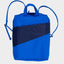 "The New Backpack" von Susan Bijl - Blauer Rucksack mit navyfarbenem Streifen, ideal für Arbeit und Schule